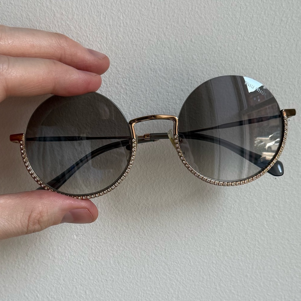 Miu Miu Gold Frame Sunglasses with Black Lenses